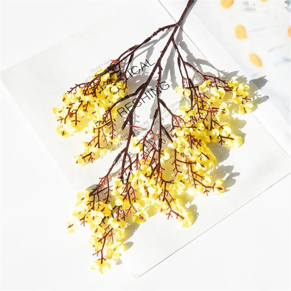 Pair of purple artificial Gypsophila flowers from Corporación Turística, realistic faux flowers for home decor.