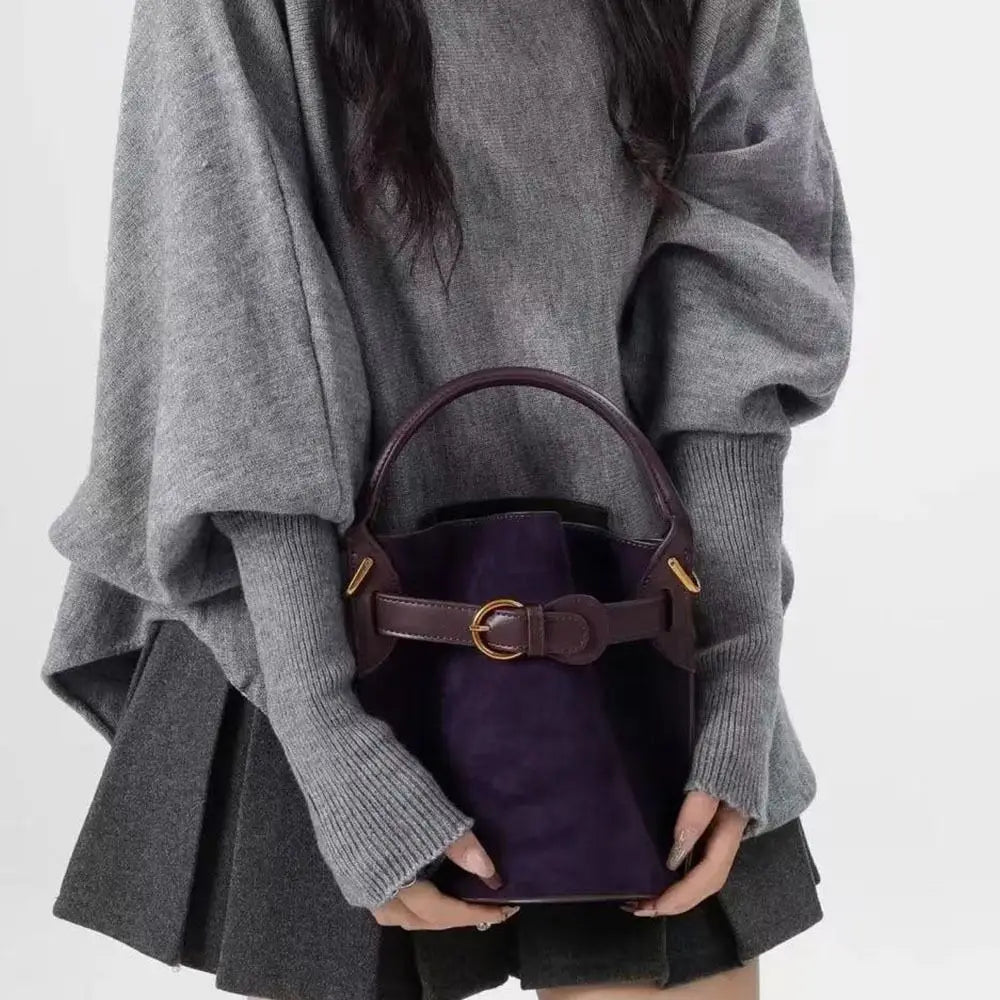 Purple luxury PU tote bag with versatile cube design, featuring a spacious interior and stylish handles for everyday use.