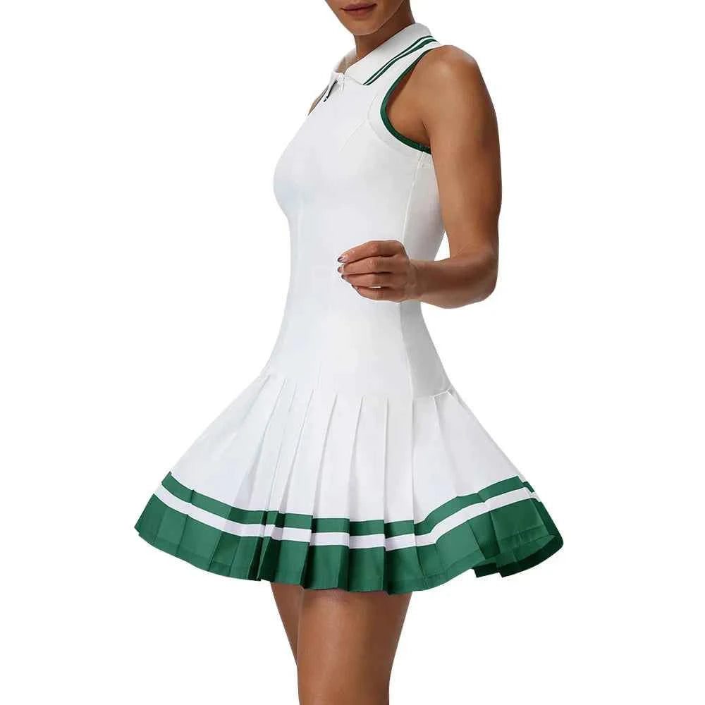 Purple one-piece tennis dress with foldable collar by Corporación Turística, shown on a model.