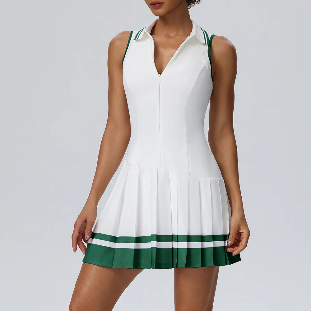 Purple one-piece tennis dress with fold-over collar by Corporación Turística, featuring a fitted design and athletic style.