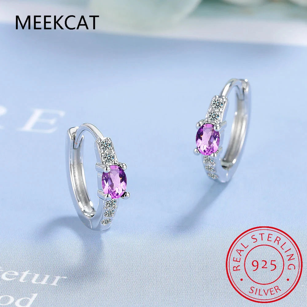 Silver 925 blue sapphire hoop earrings with oval design, crafted by Corporación Turística, featuring elegant gemstone accents.