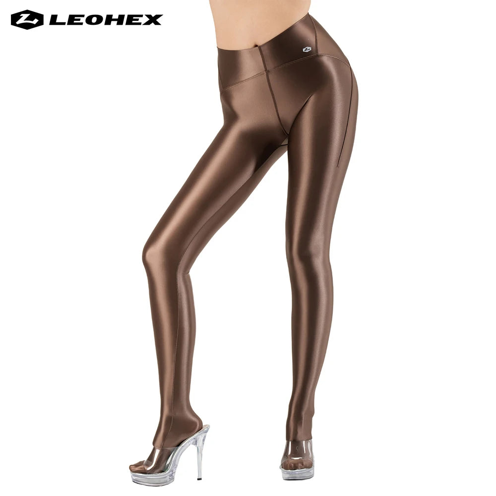 High-waisted shiny and silky purple pantyhose by Corporación Turística, featuring a sleek, smooth texture and vibrant color.