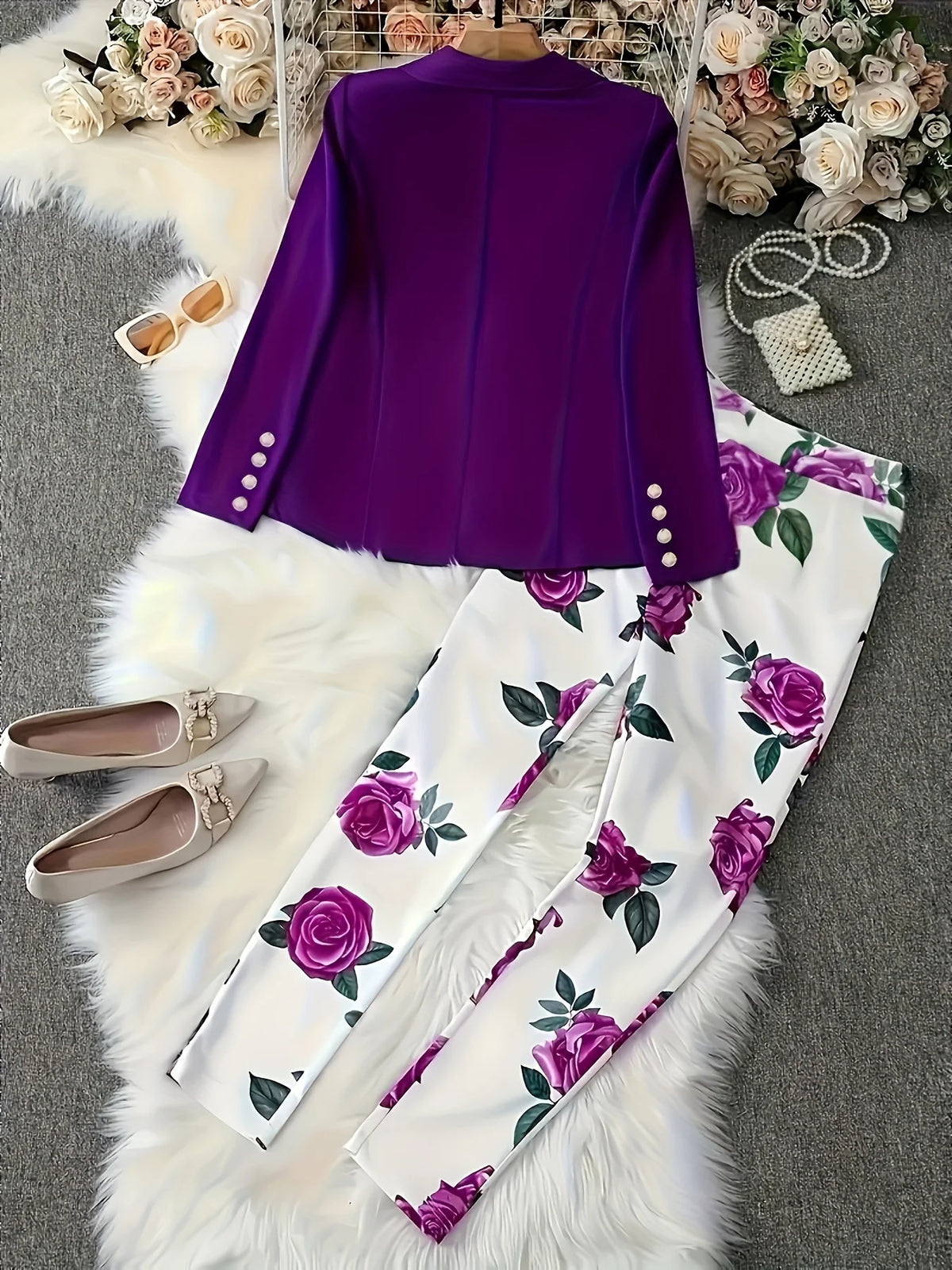 Elegant two-piece fashion set with lapel collar from Corporación Turística, featuring a stylish, modern design in purple.