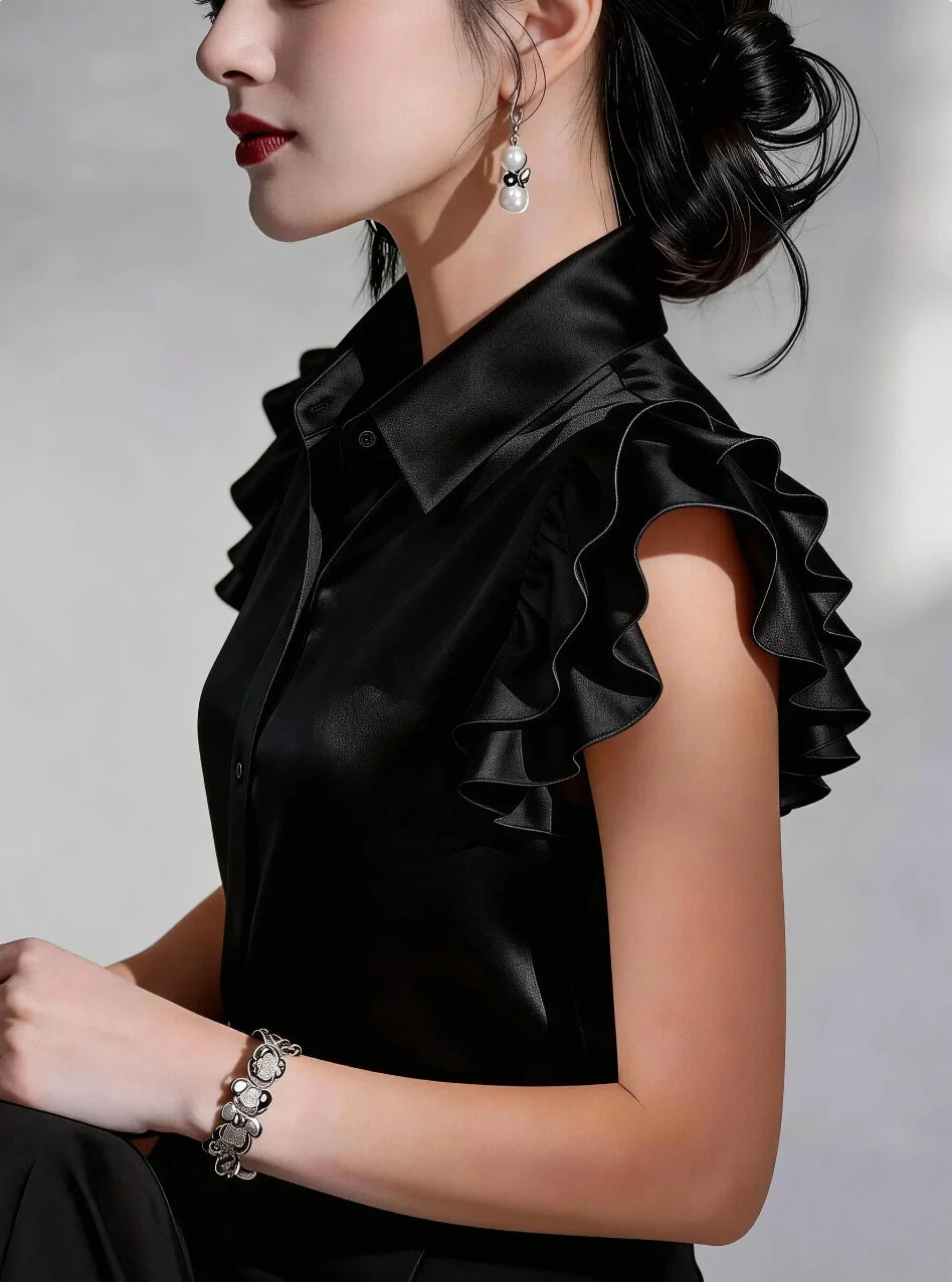 Elegant purple satin blouse for women with button details by Corporación Turística, showcasing a smooth, luxurious fabric and stylish design.