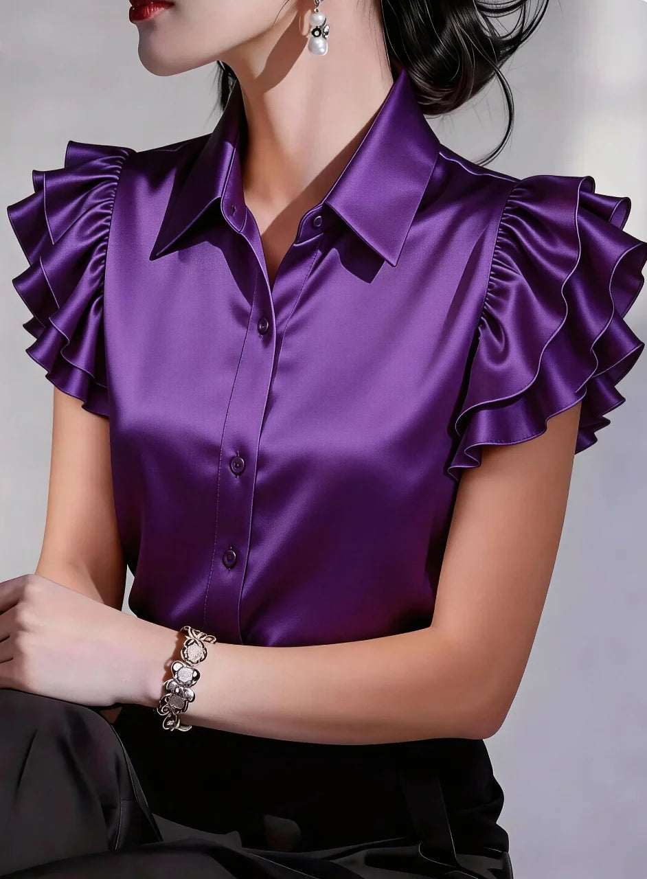 Elegant women's satin blouse with buttons, purple color, from Corporación Turística, featuring a stylish and smooth fabric.