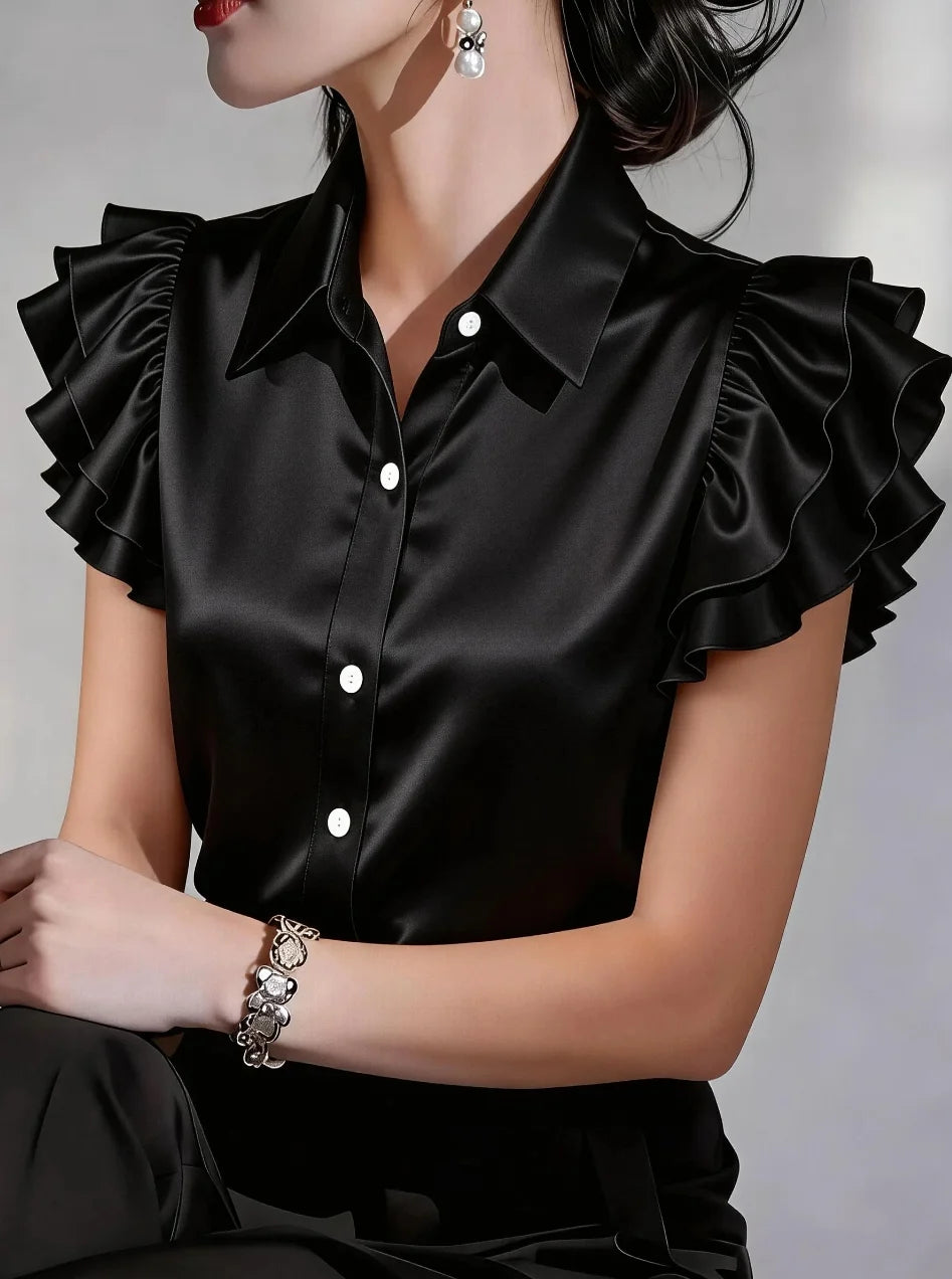 Elegant satin blouse with buttons for women by Corporación Turística, featuring a smooth purple fabric and stylish design.