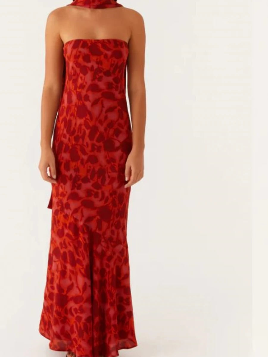 Elegant long fitted women's dress with a matching scarf by Corporación Turística, shown in a deep purple color.