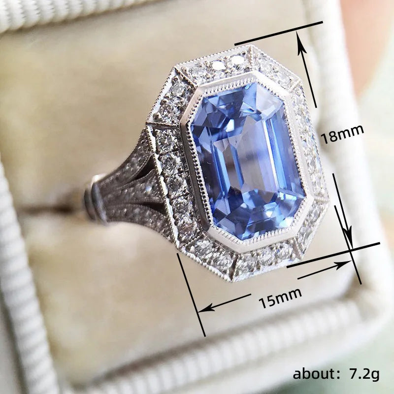 Elegant blue CZ temperament ring for women by Huitan, featuring a stylish design and sparkling gemstone.