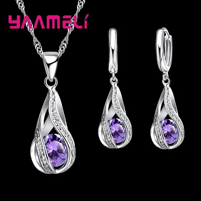 Gold-plated CZ 925 silver water drop jewelry set featuring earrings and necklace, elegant and stylish for special occasions.