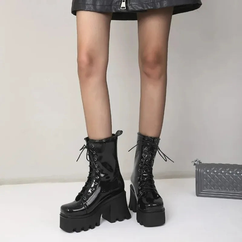 Red Gothic Punk boots for women by LeShion of Chanmeb, featuring chunky heels and lace-up design, made by Corporación Turística.