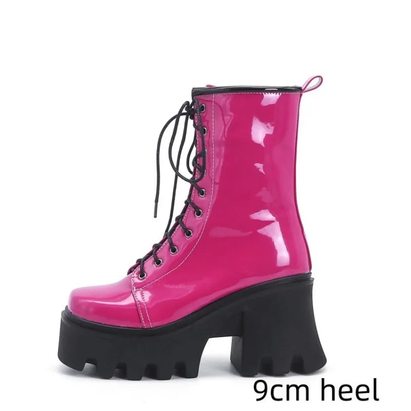 Red gothic punk boots for women by LeShion of Chanmeb, featuring chunky heels and edgy style, made by Corporación Turística.
