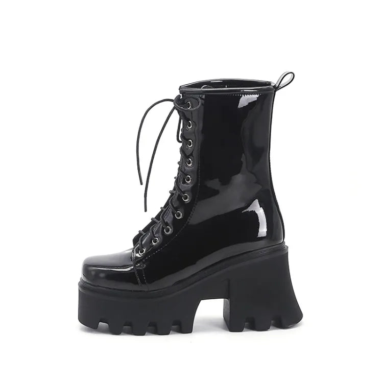 Red gothic punk boots for women by LeShion of Chanmeb, featuring a bold design with chunky heels and lace-up front.