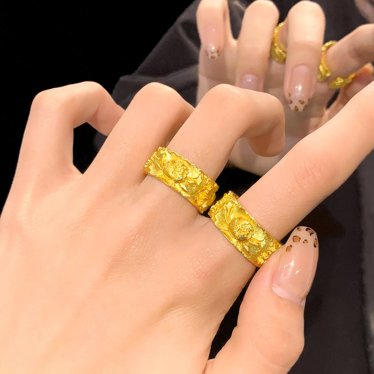 Open women's peony relief ring by Corporación Turística, featuring intricate floral design on a 9.5mm band.
