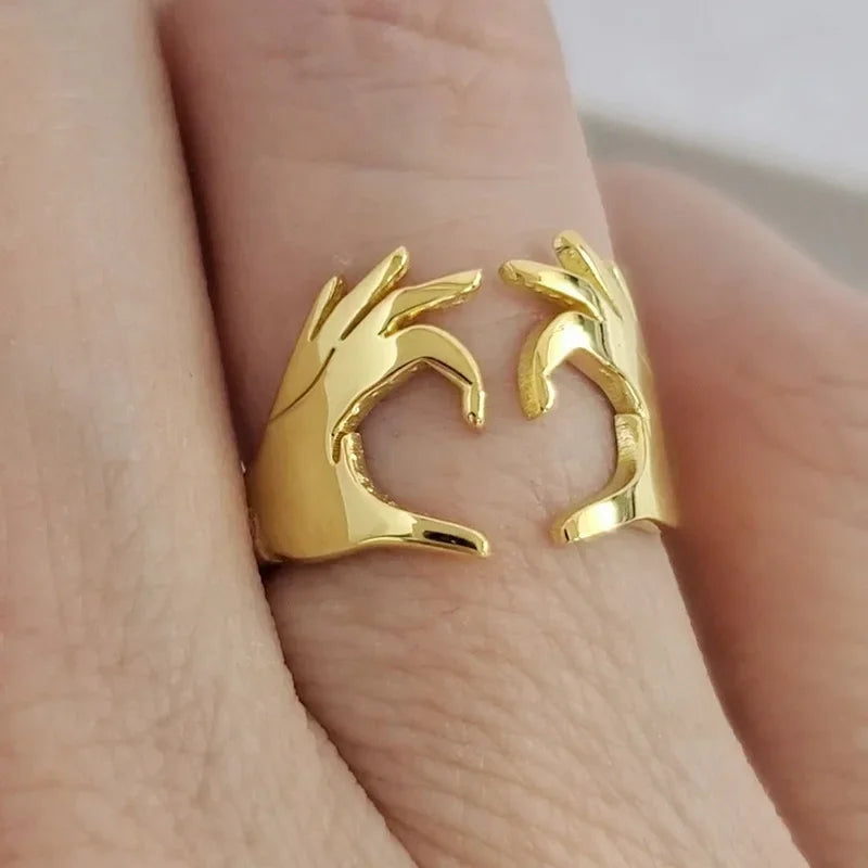 Adjustable heart-shaped ring from Corporación Turística, European and American style, featuring intricate design details.