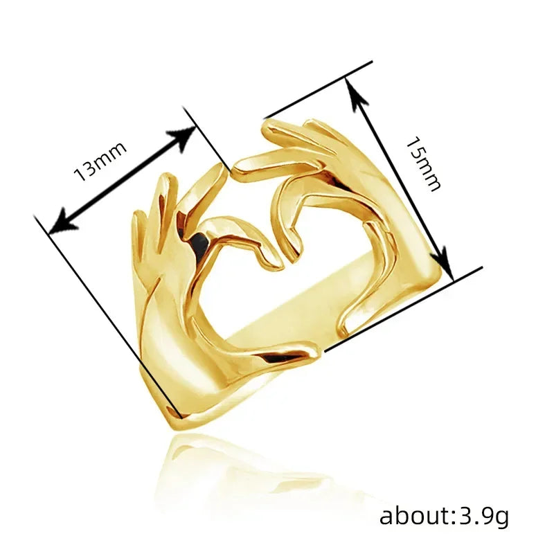 Adjustable heart-shaped ring by Corporación Turística, European and American style, featuring intricate design and silver finish.