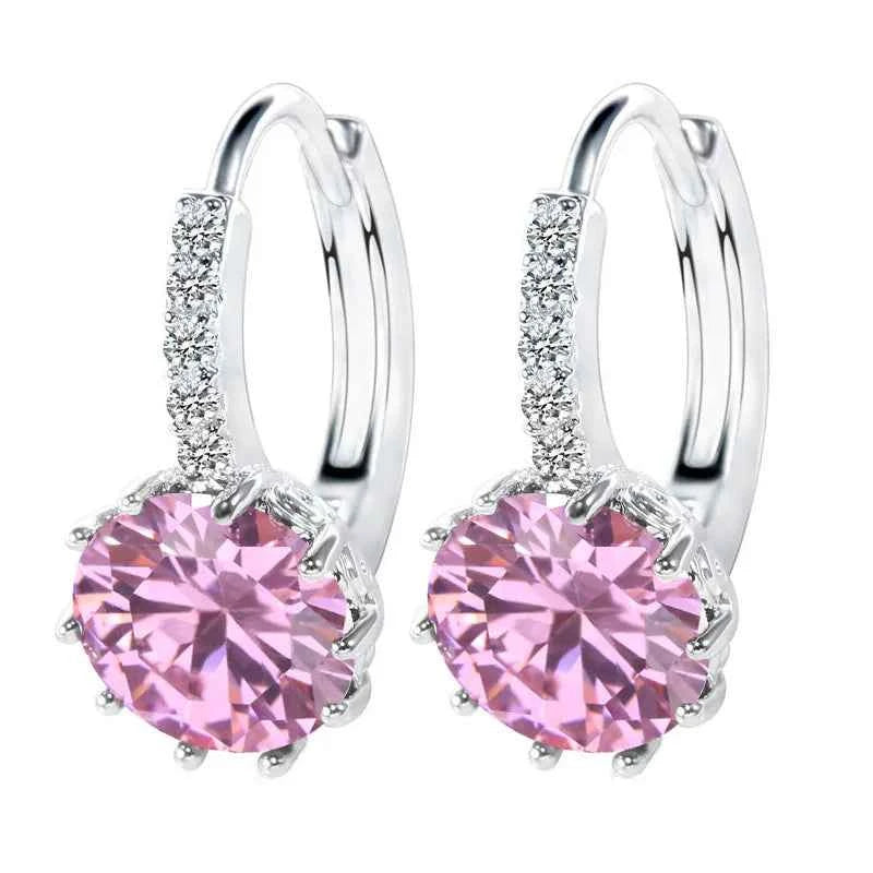 Red circular cubic zirconia hoop earrings for women by YAAMELI, featuring sparkling stones and sleek design.