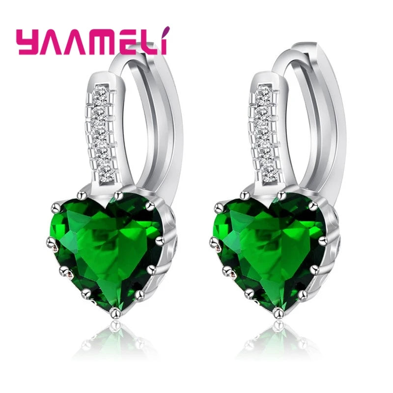 Red circular cubic zirconia hoop earrings for women by YAAMELI, crafted with sparkling cubic zirconia stones.