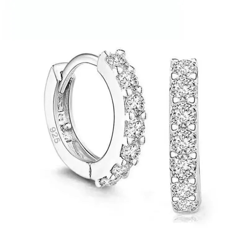 Red circular cubic zirconia hoop earrings for women by YAAMELI, showcasing shiny, elegant jewelry with a classic design.