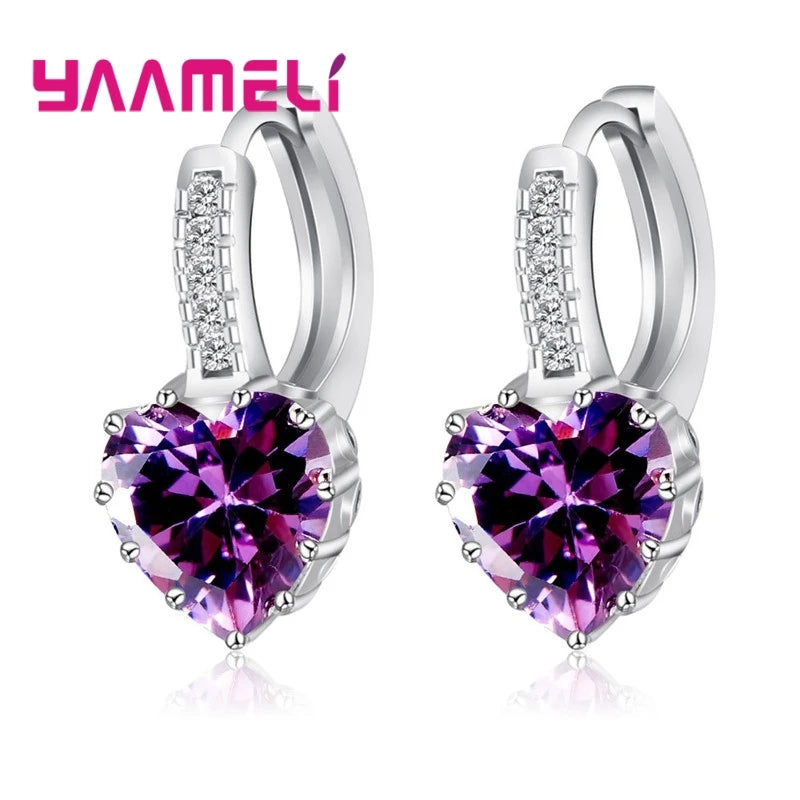 YAAMELI circular red cubic zirconia hoop earrings for women, stylish jewelry from Corporación Turística.