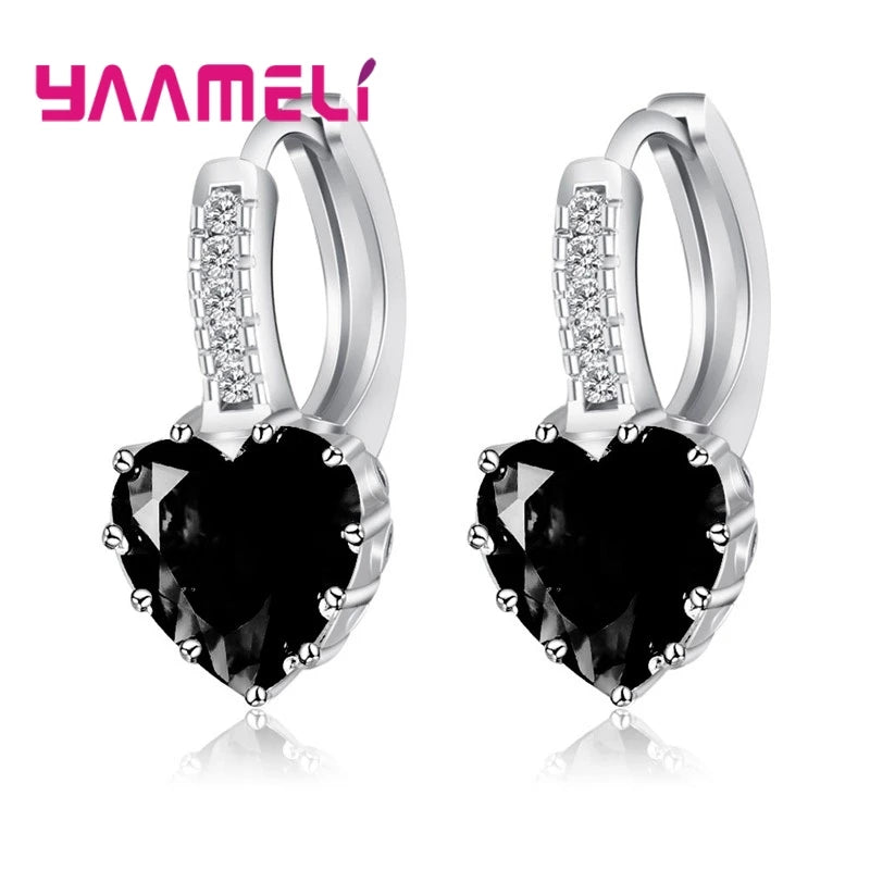Red circular cubic zirconia hoop earrings for women by YAAMELI, stylish jewelry from Corporación Turística.