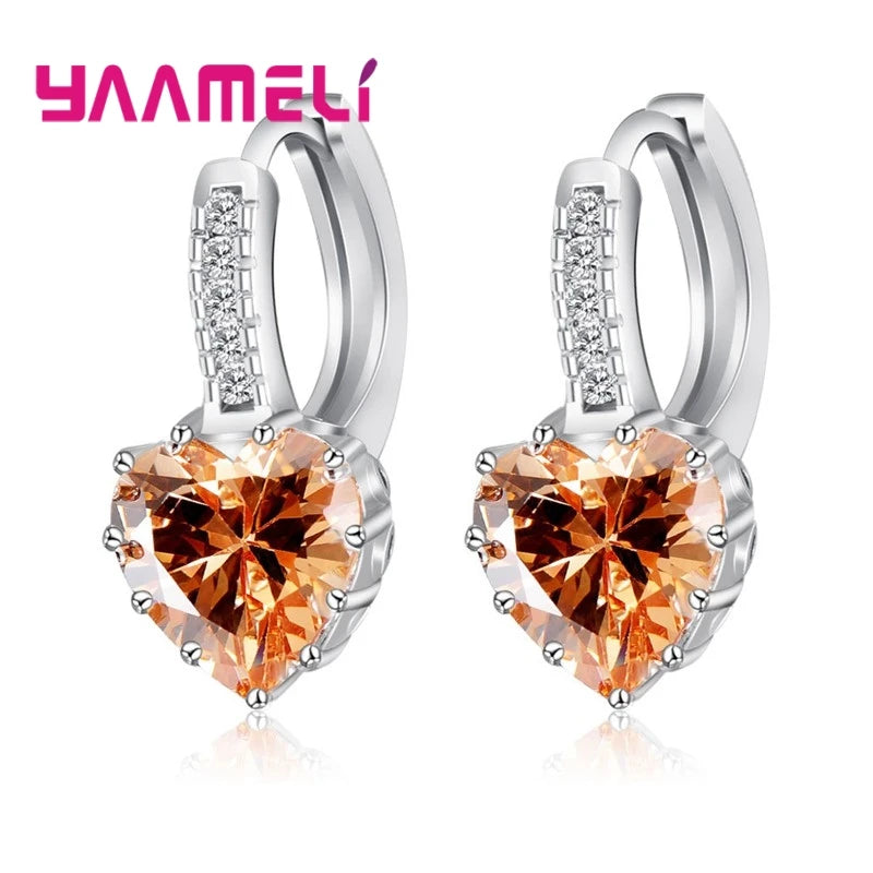 YAAMELI circular red cubic zirconia hoop earrings for women, featuring sparkling stones and classic jewelry style.