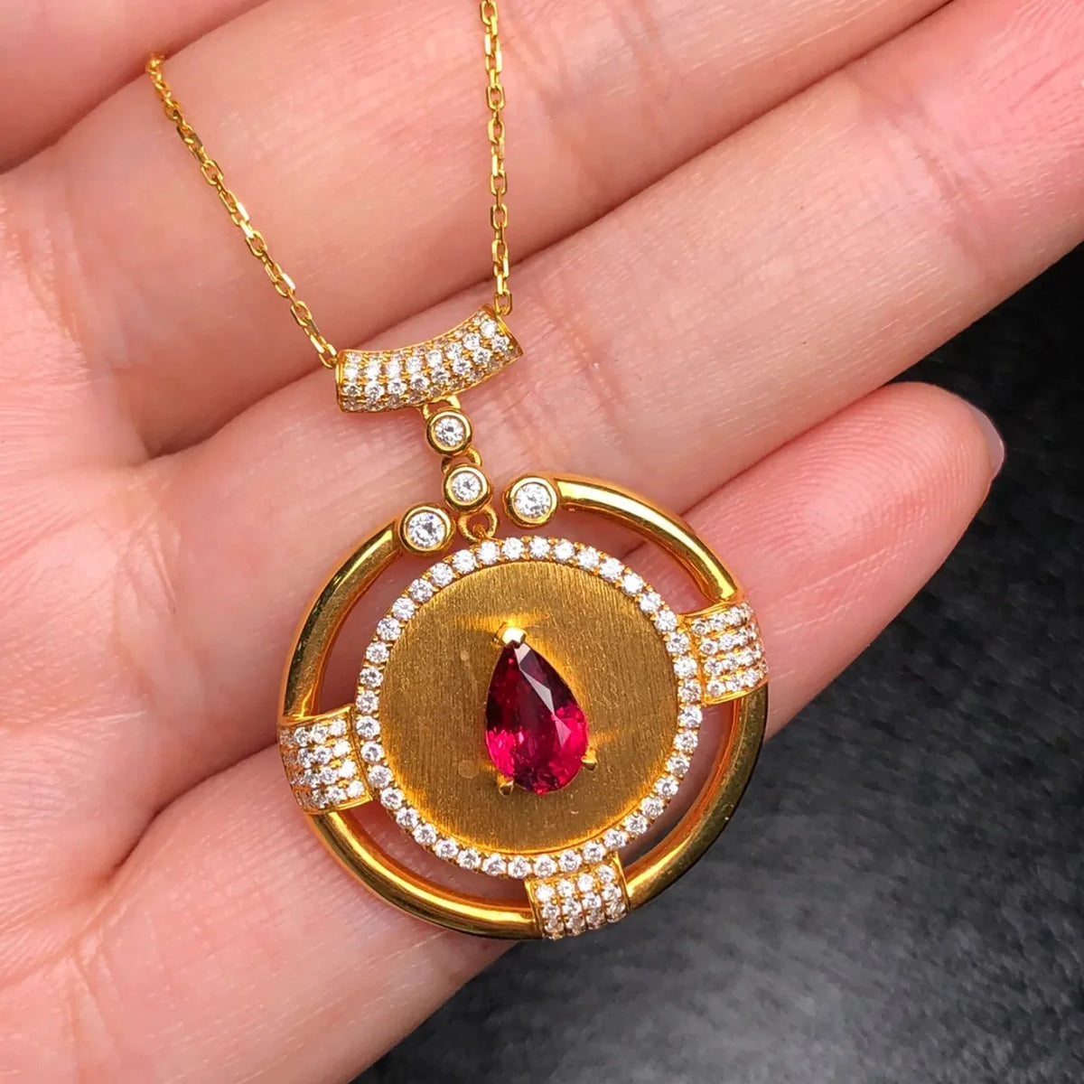 14K rose gold pendant with a 2-carat gemstone for women, showcasing a vibrant red color and elegant design.