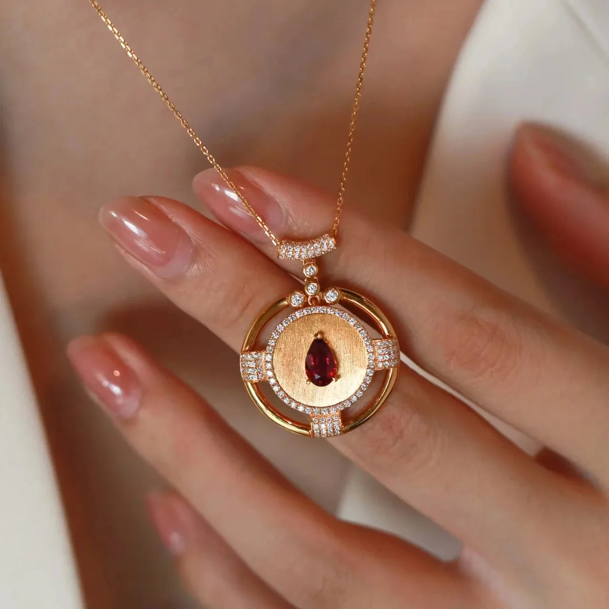 14K rose gold pendant with a 2-carat gemstone for women, featuring a vibrant red hue and elegant design.