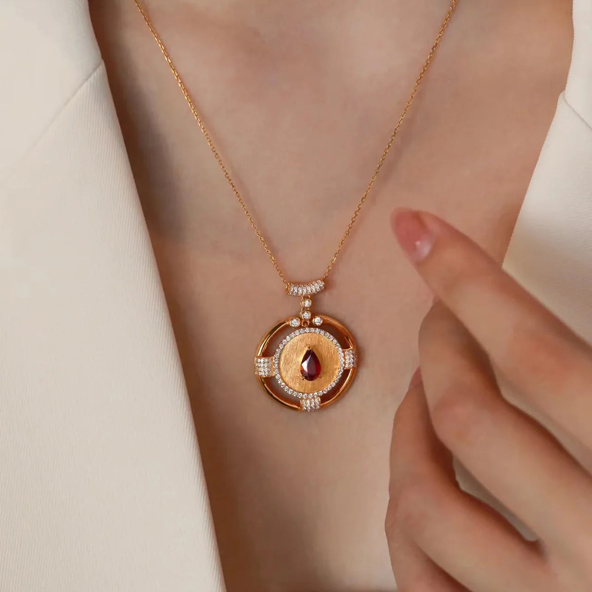 14K rose gold pendant with 2-carat gemstone for women, featuring a vibrant red hue and elegant design.