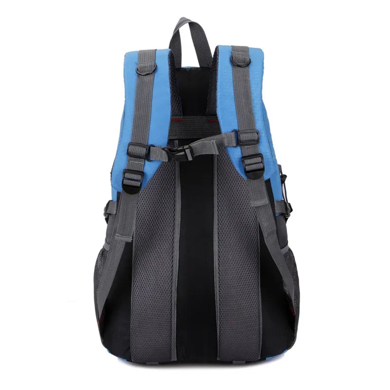 Red waterproof nylon travel backpack by Corporación Turística, featuring multiple compartments and durable design for travel use.