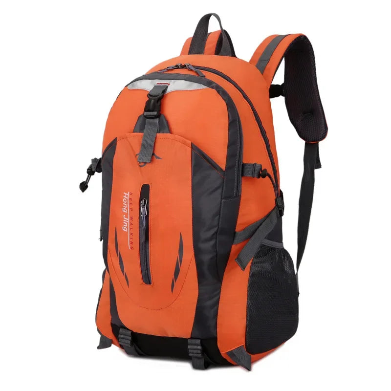Red waterproof nylon travel backpack by Corporación Turística showing multiple compartments and adjustable straps.