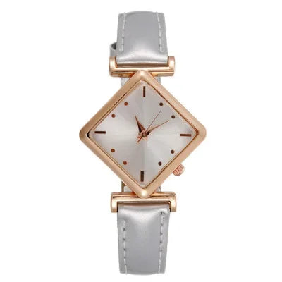 Elegant red women's quartz watch with a diamond-shaped pointer, featuring a sleek design from Corporación Turística.