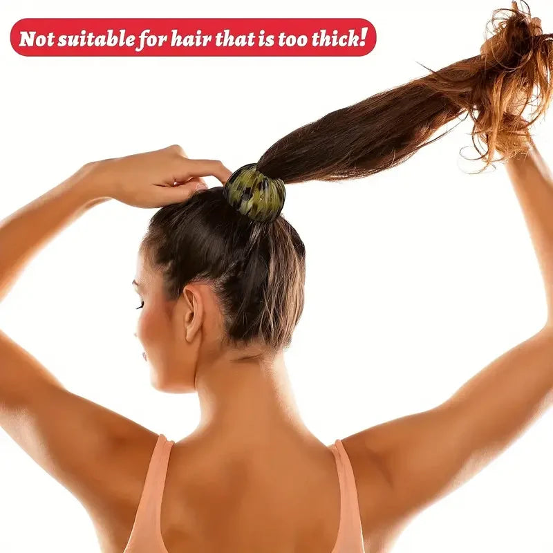 Red bird nest-shaped hair clip from Corporación Turística, trendy hair accessory for stylish hair styling.