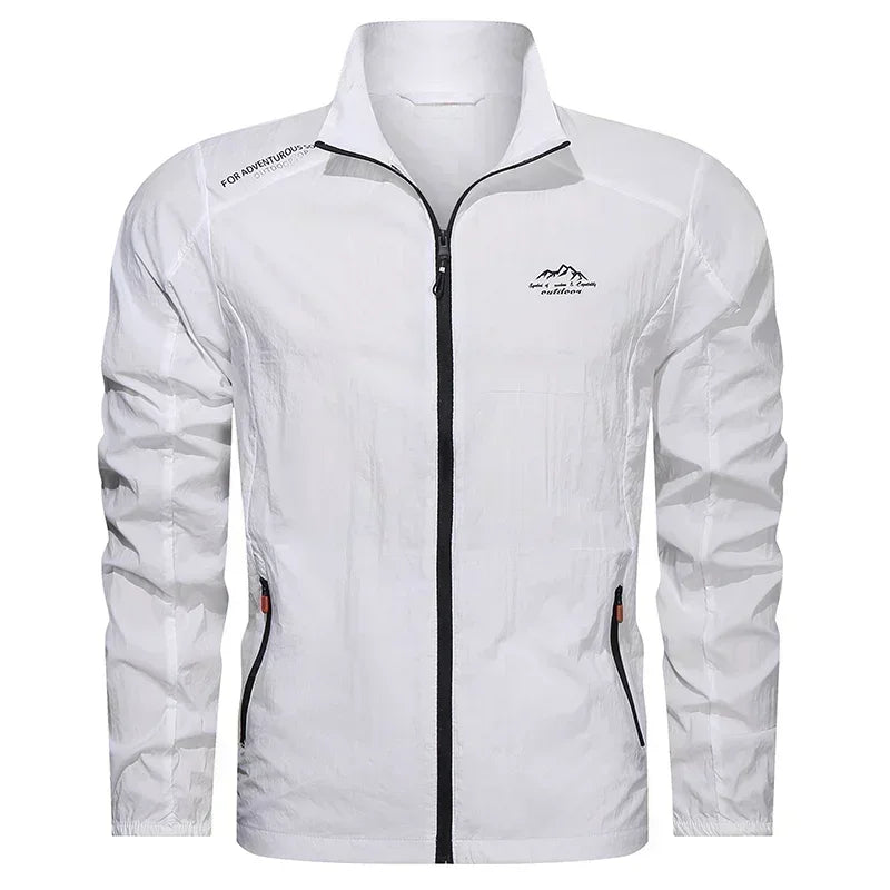 Men's denim blue UPF100+ summer windbreaker jacket with pockets, ultralight UV protective outdoor clothing by Corporación Turística.