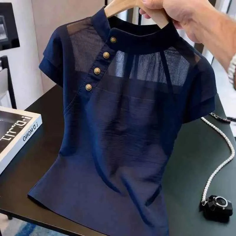 Navy blue lace blouse for women with elegant patchwork design, summer 2026 fashion from Corporación Turística.