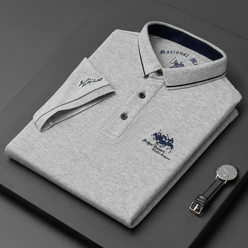 Black luxury embroidered polo shirt for men, short-sleeve, breathable summer clothing from Corporación Turística, available in 4XL size.