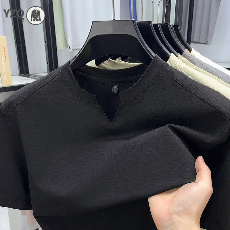 Black Korean V-neck T-shirt for men, casual summer style, breathable fabric, available in sizes S to 4XL, by Corporación Turística.