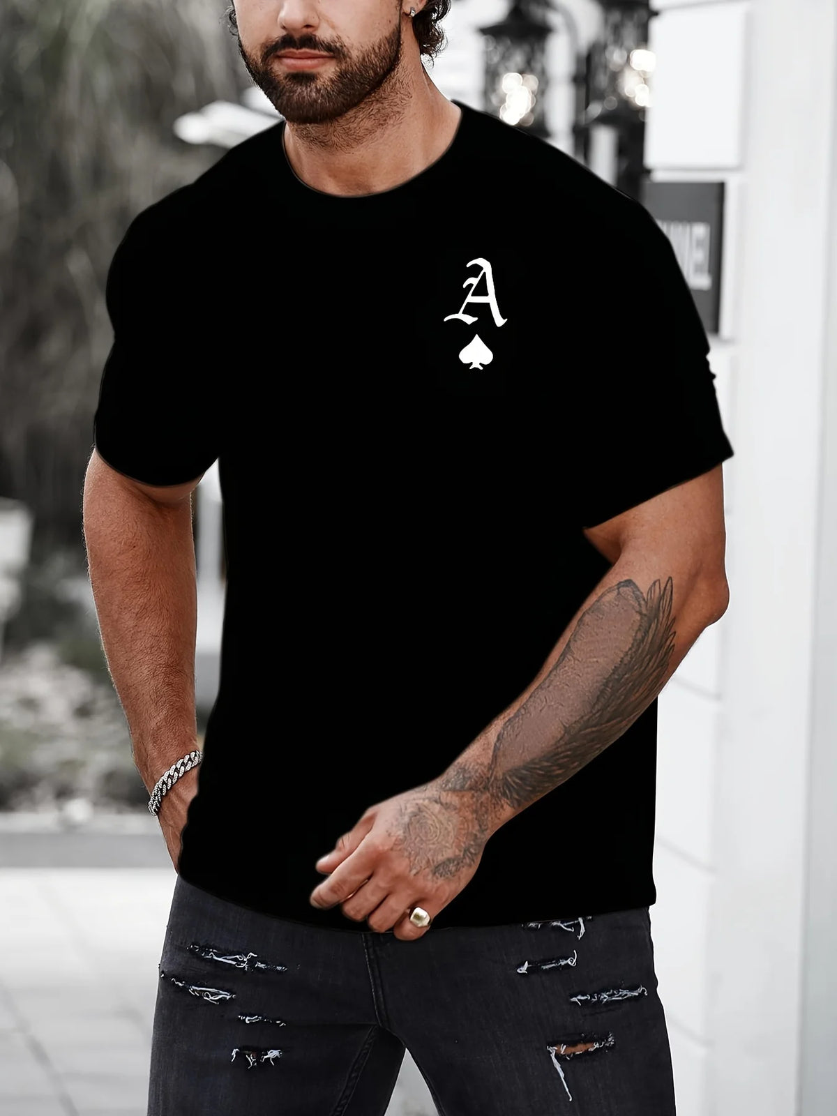 Black men's "King" T-shirt by Corporación Turística with gold print, casual style, short sleeves, and crew neck.