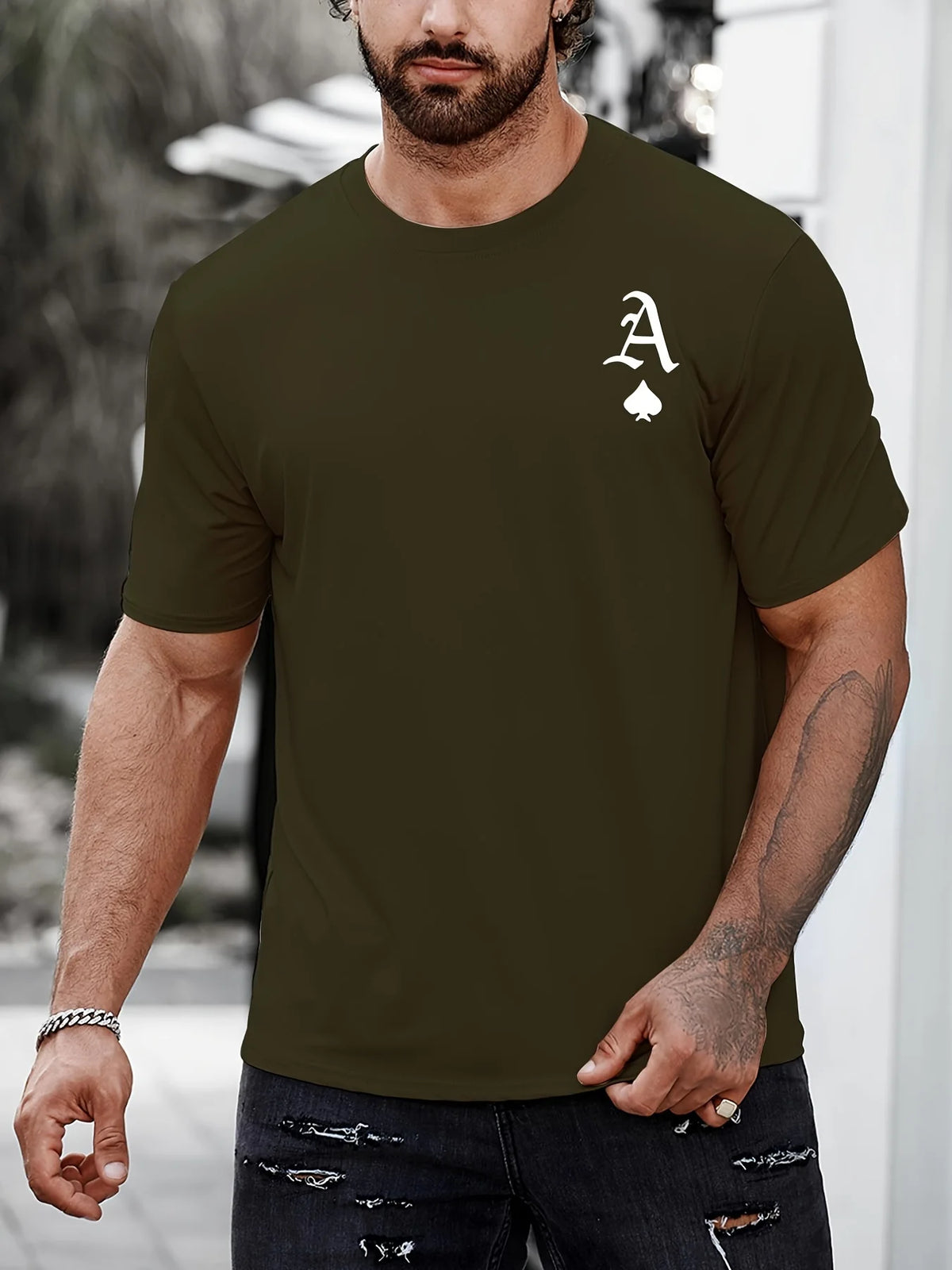 Black "King" men's T-shirt by Corporación Turística with gold print, casual style, crew neck and short sleeves.