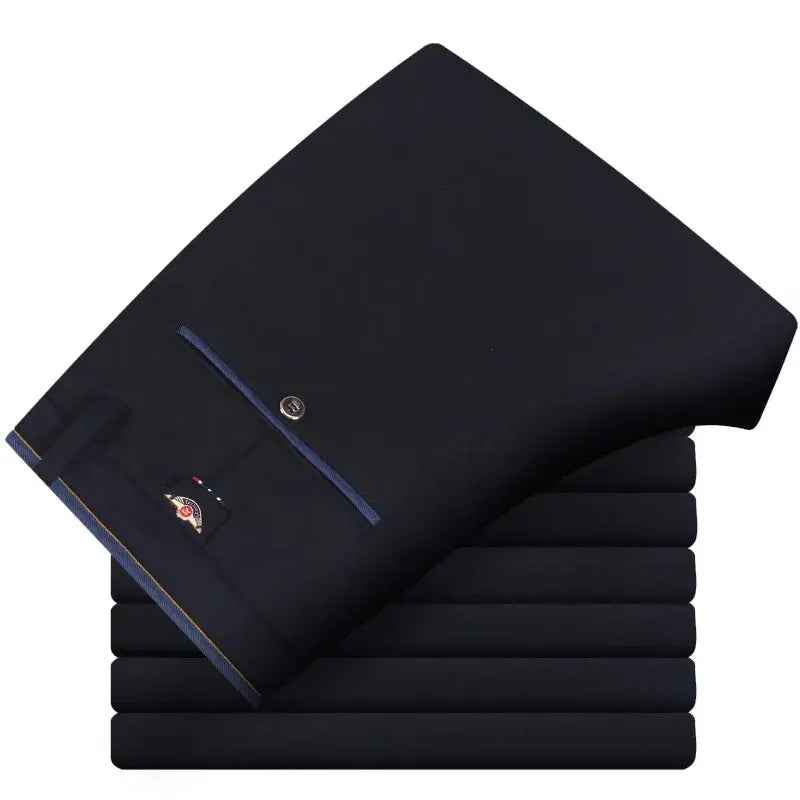 Blue elastic straight pants for men by Corporación Turística, suitable for casual and business wear, shown on a model.