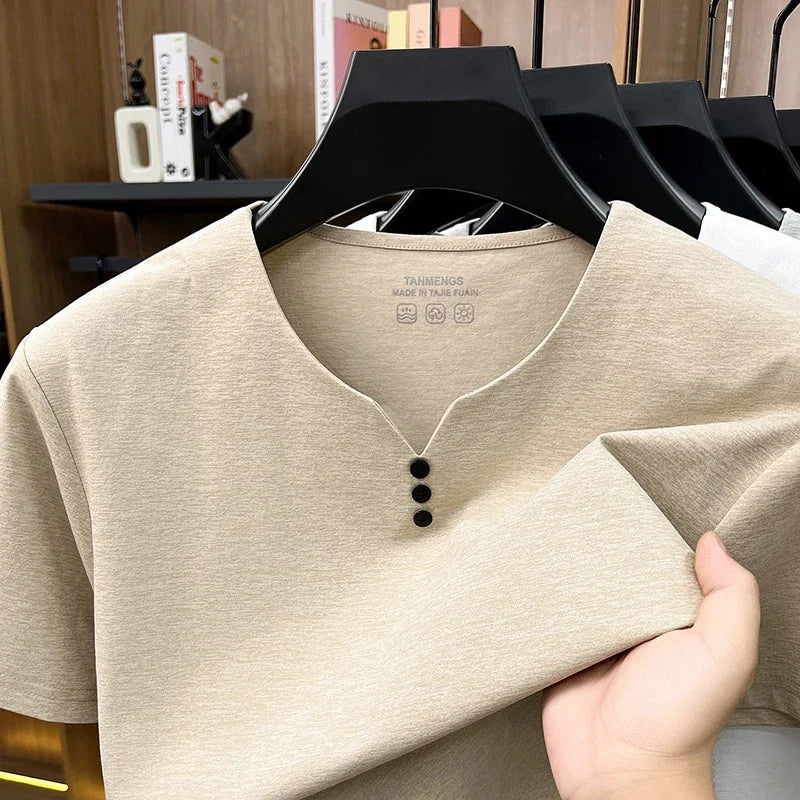 White men's Henley summer T-shirt by Corporación Turística, casual short-sleeve cotton shirt with breathable fabric.