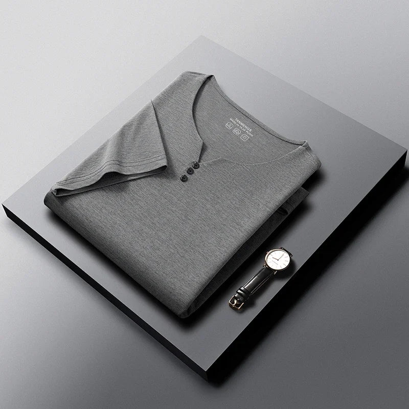White men's Henley shirt by Corporación Turística, casual summer short-sleeve cotton T-shirt with breathable fabric.