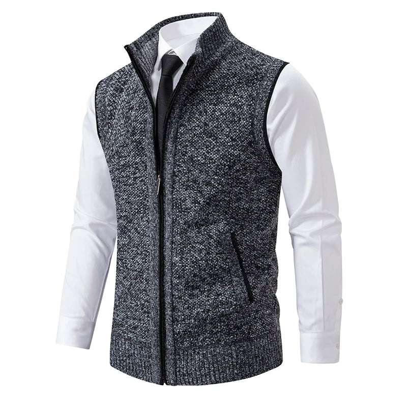 Light grey men's knitted vest with high collar, zipper, and velvet-like wool fabric, from Corporación Turística.