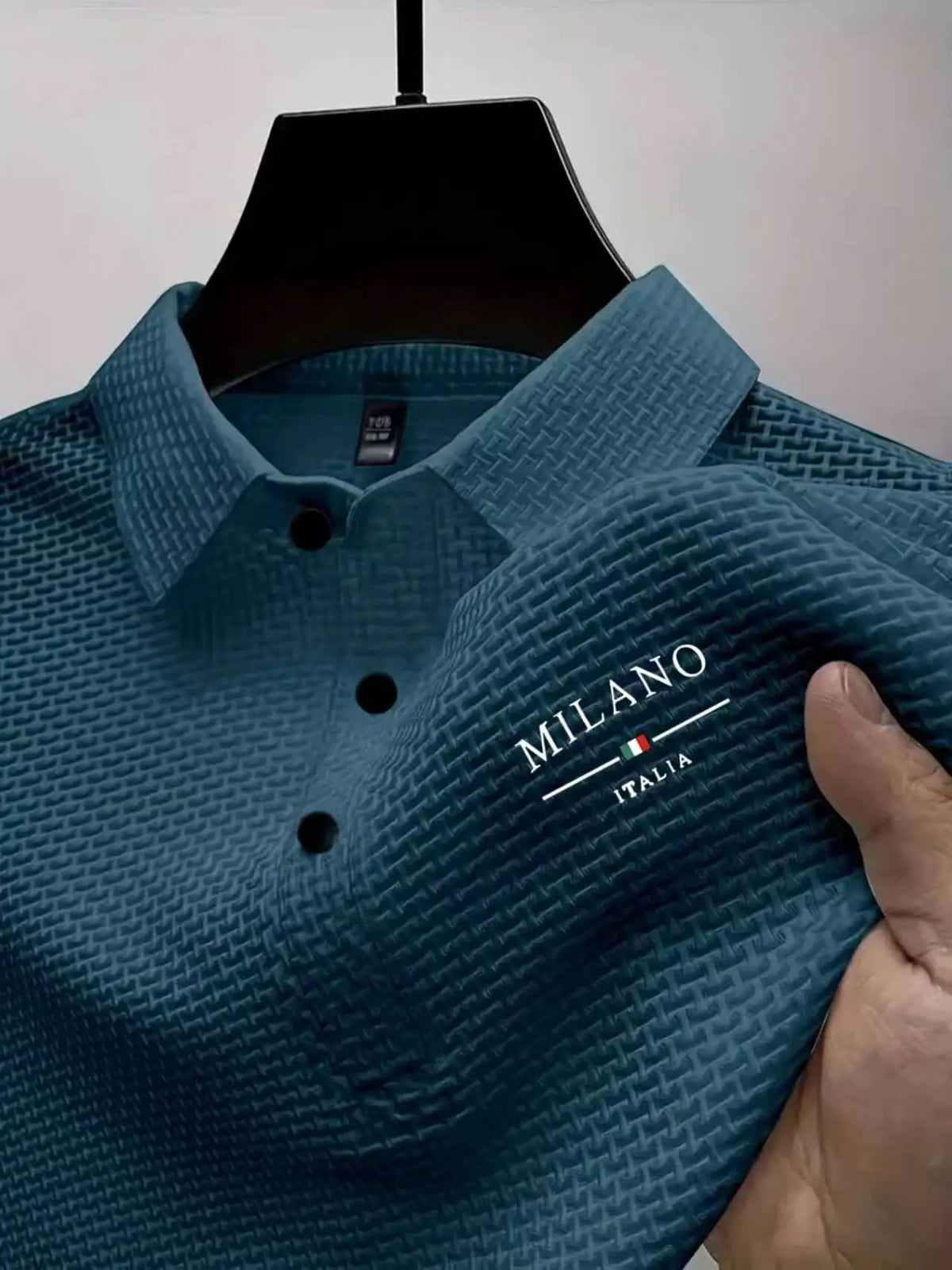 Blue men's slim fit polo shirt by Corporación Turística, casual summer style, lightweight and comfortable for warm weather.