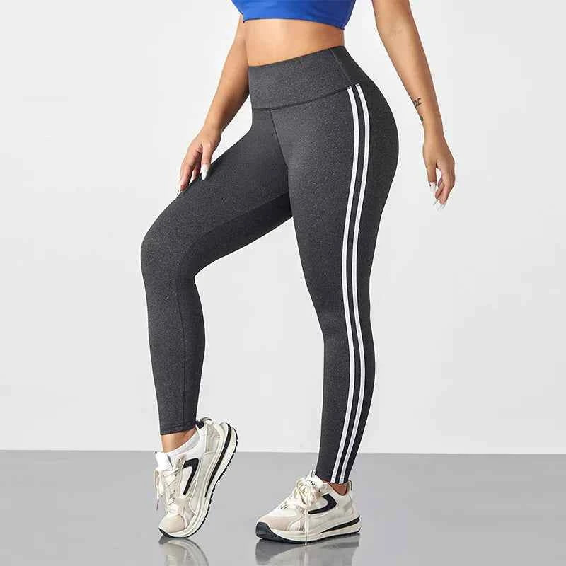 Black and dark grey women's yoga leggings with striped design, high waist control, perfect for gym and activewear.