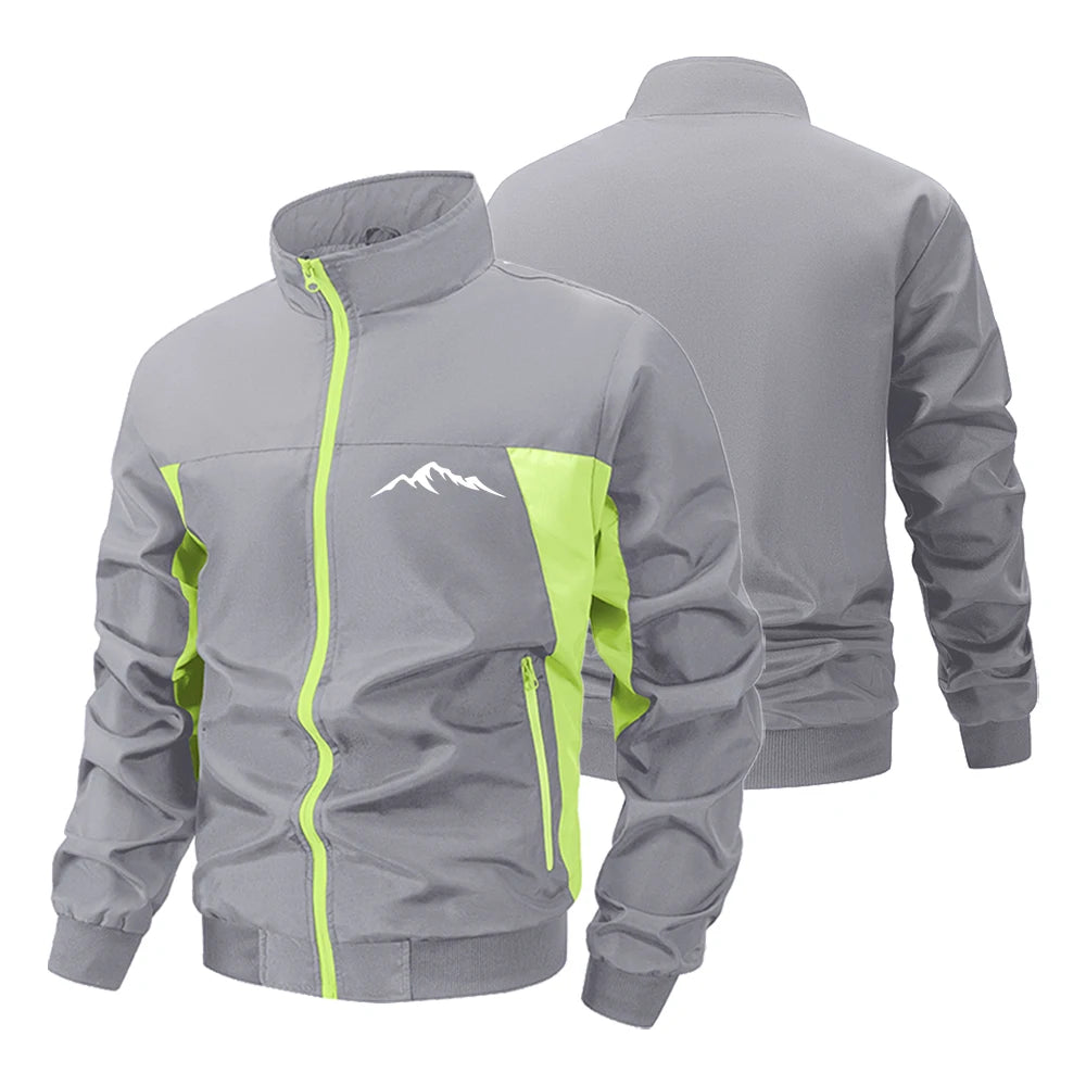 Navy and green men's windbreaker jacket by Corporación Turística, outdoor mountain style, suitable for gym and running activities.