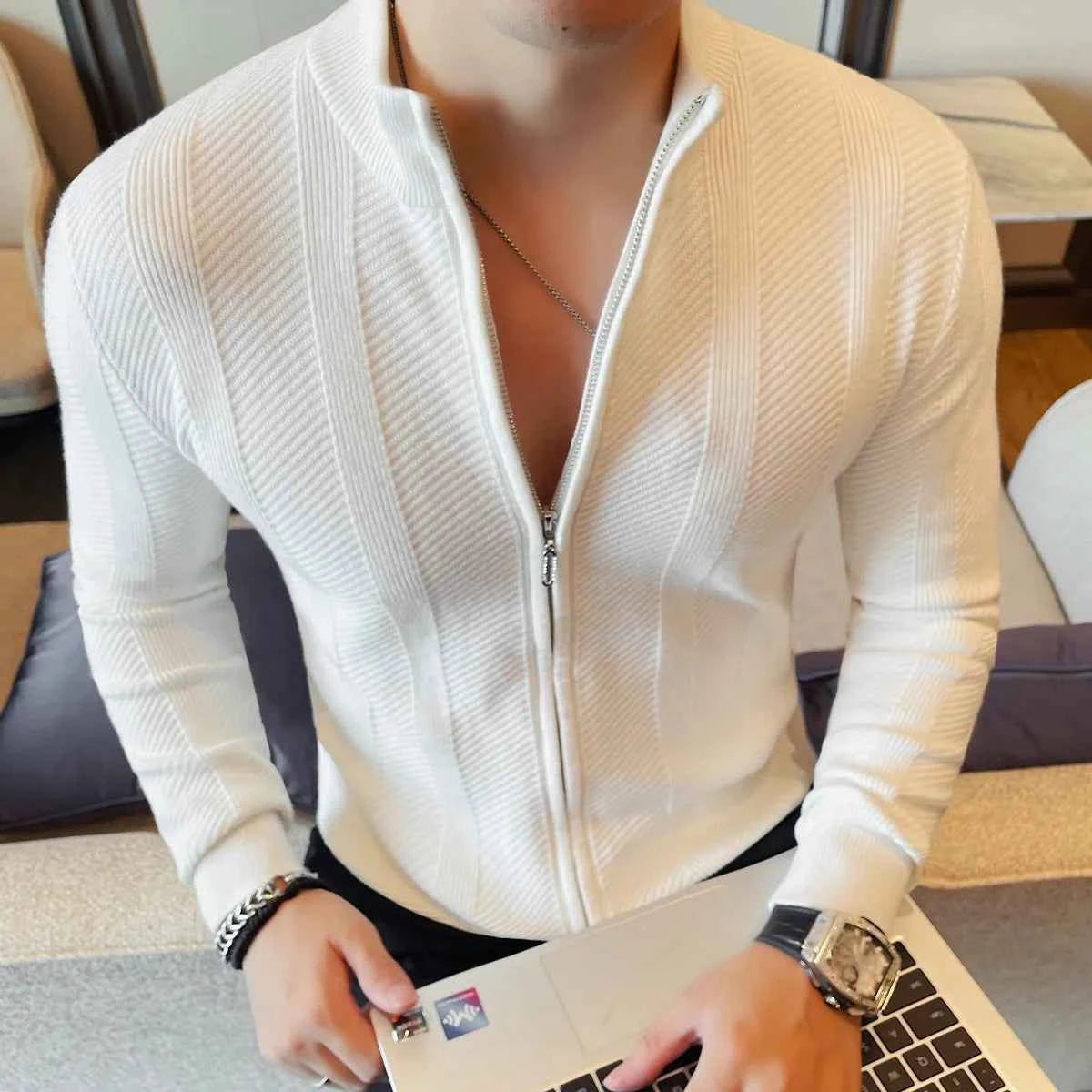 White men's warm sweater with high collar and zipper by Corporación Turística, perfect for fall and winter comfort and style.