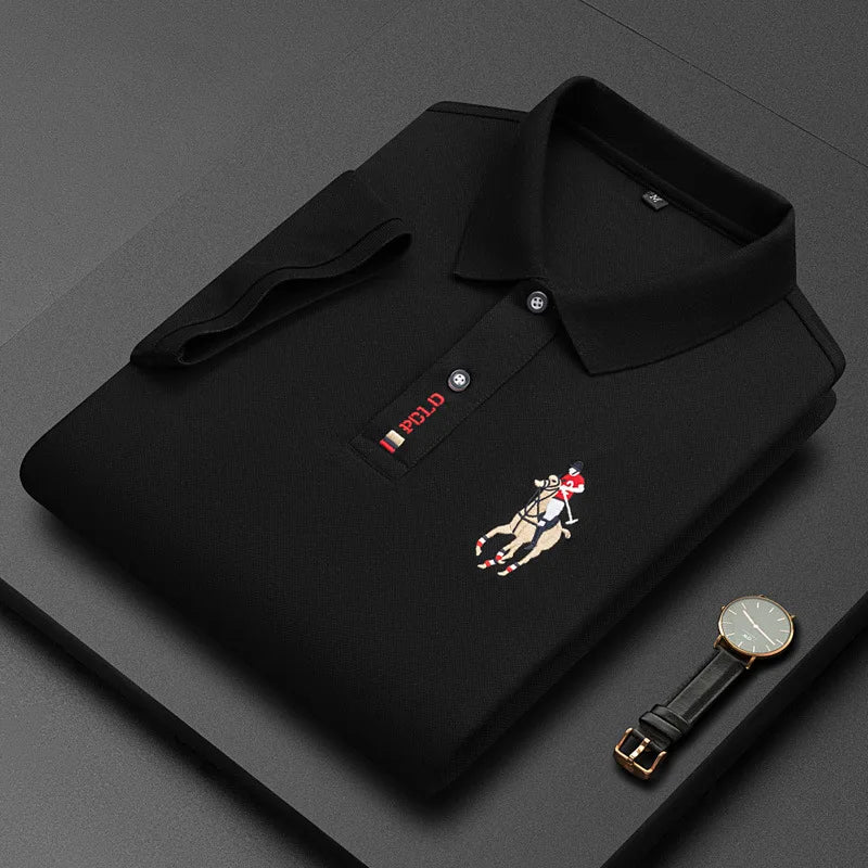 Men's embroidered cotton polo shirt in 4XL by Corporación Turística, casual and breathable, shown in a close-up image.