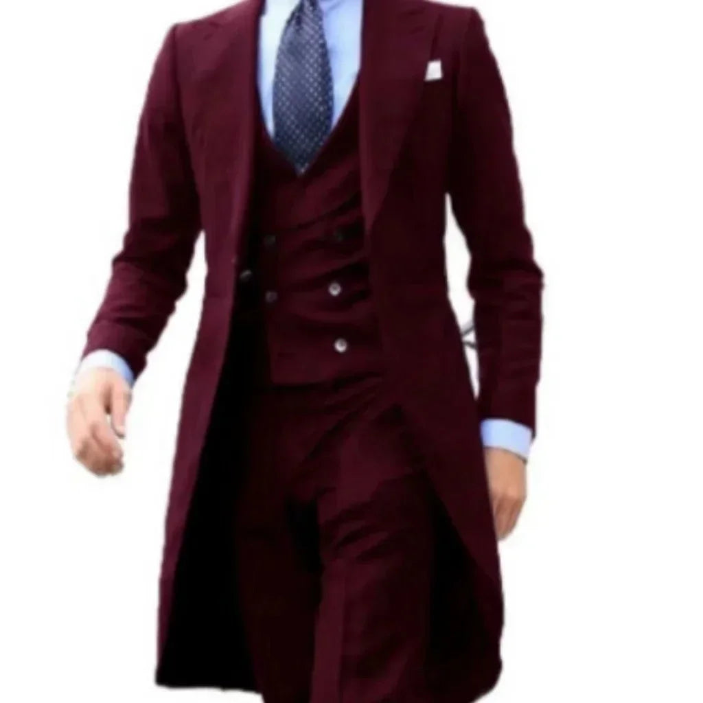 Wine red 3-piece men's formal suit with peak lapel and long tail, from Corporación Turística, shown on a mannequin.