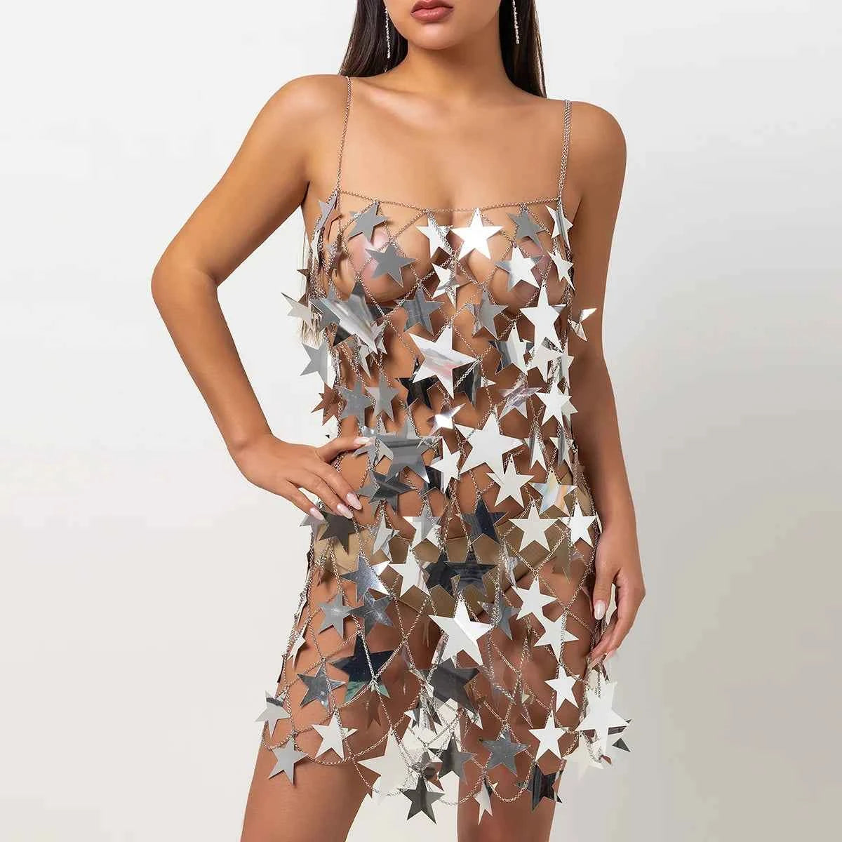 Sexy black mini dress by Corporación Turística featuring a shimmering golden skirt, perfect for stylish party occasions.