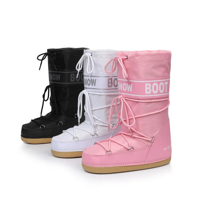 Pink winter snow boots by Corporación Turística, mid-calf length, perfect for cold weather and snowy conditions.